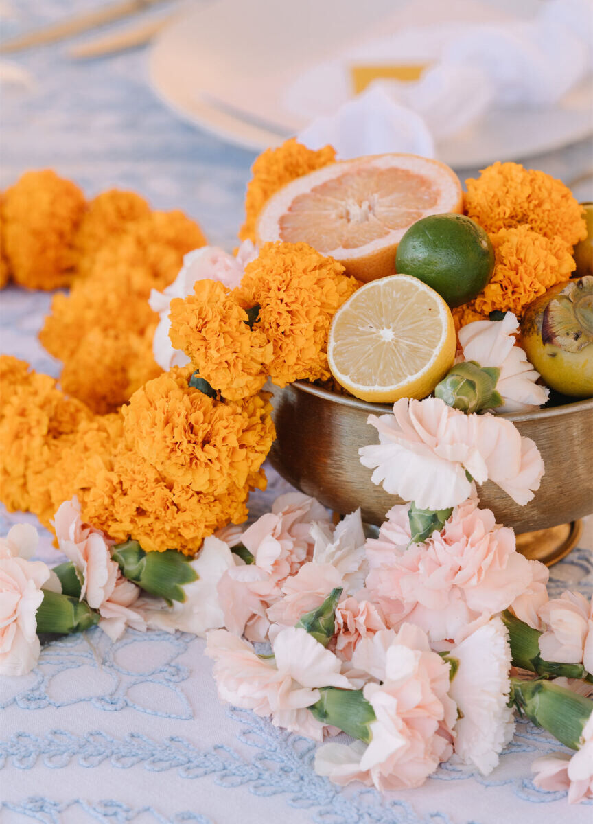 Cut fruit accented the floral and decor at an Indian fusion wedding in Texas.