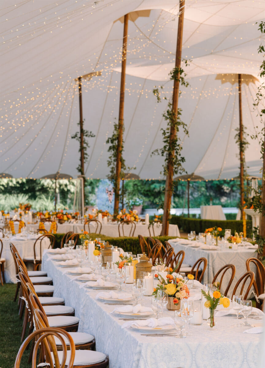 Twinkle lights filled the top of the tent at an Indian fusion wedding reception.