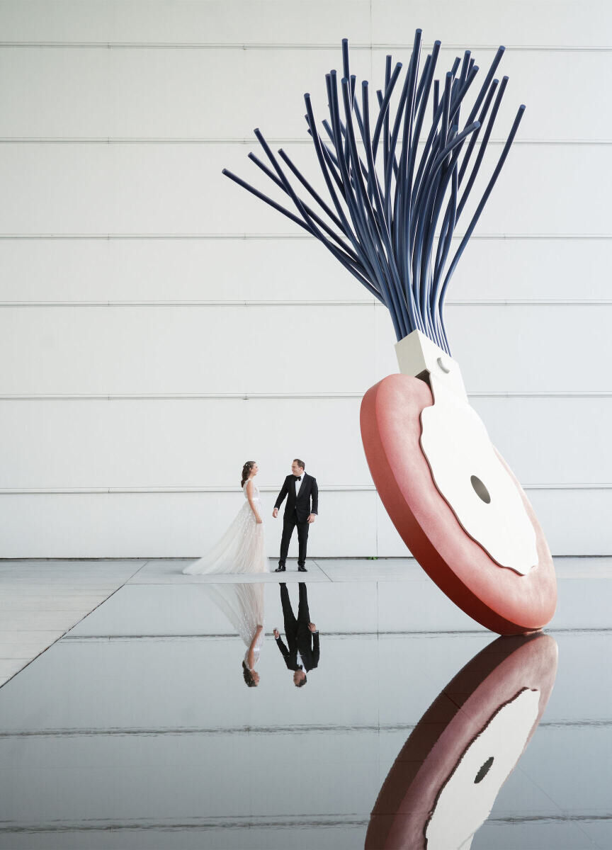 Best Wedding Venues for Creative Couples: A bride and groom at the Norton Museum of Art.